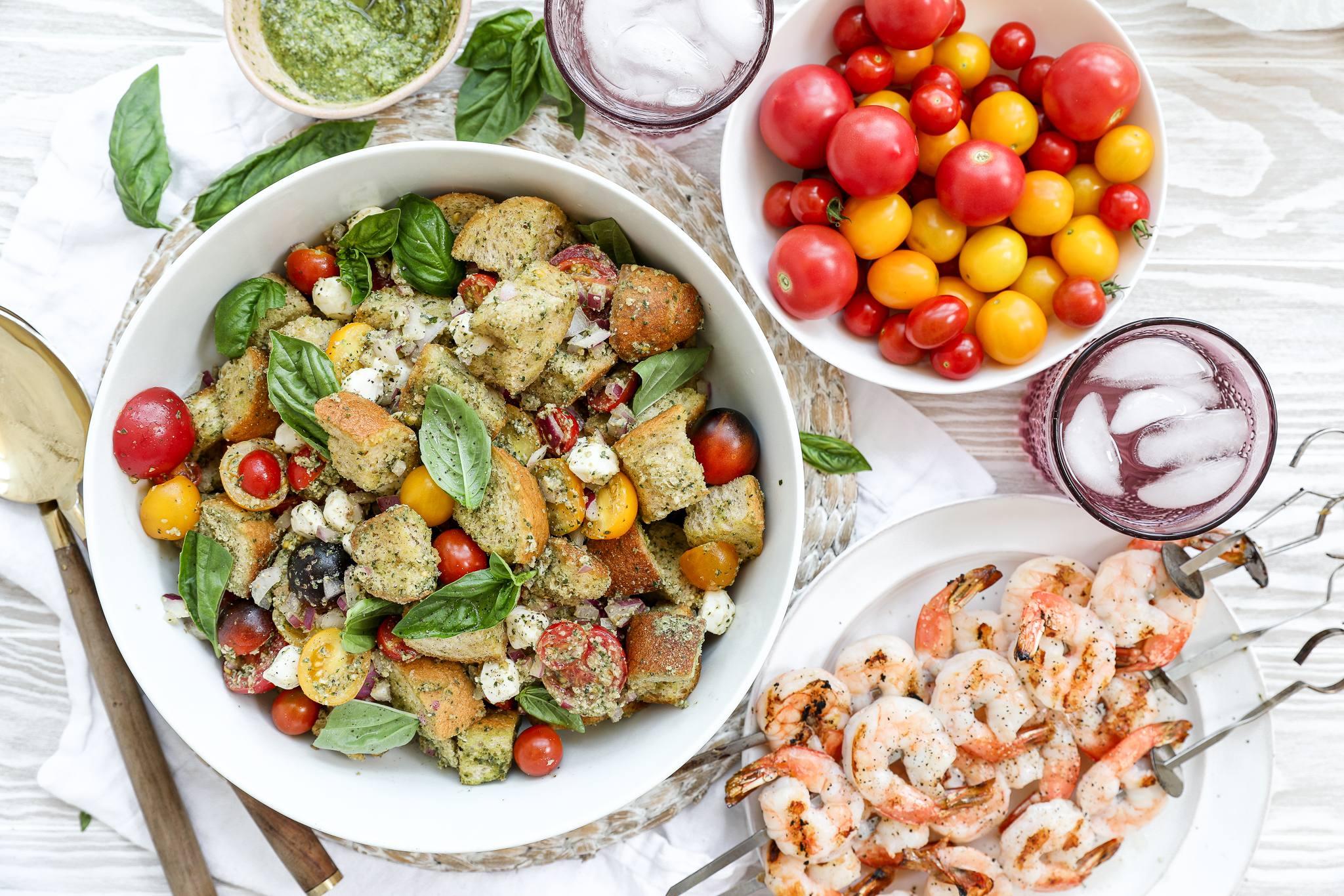 An overhead image of panzanella salad with shrimp